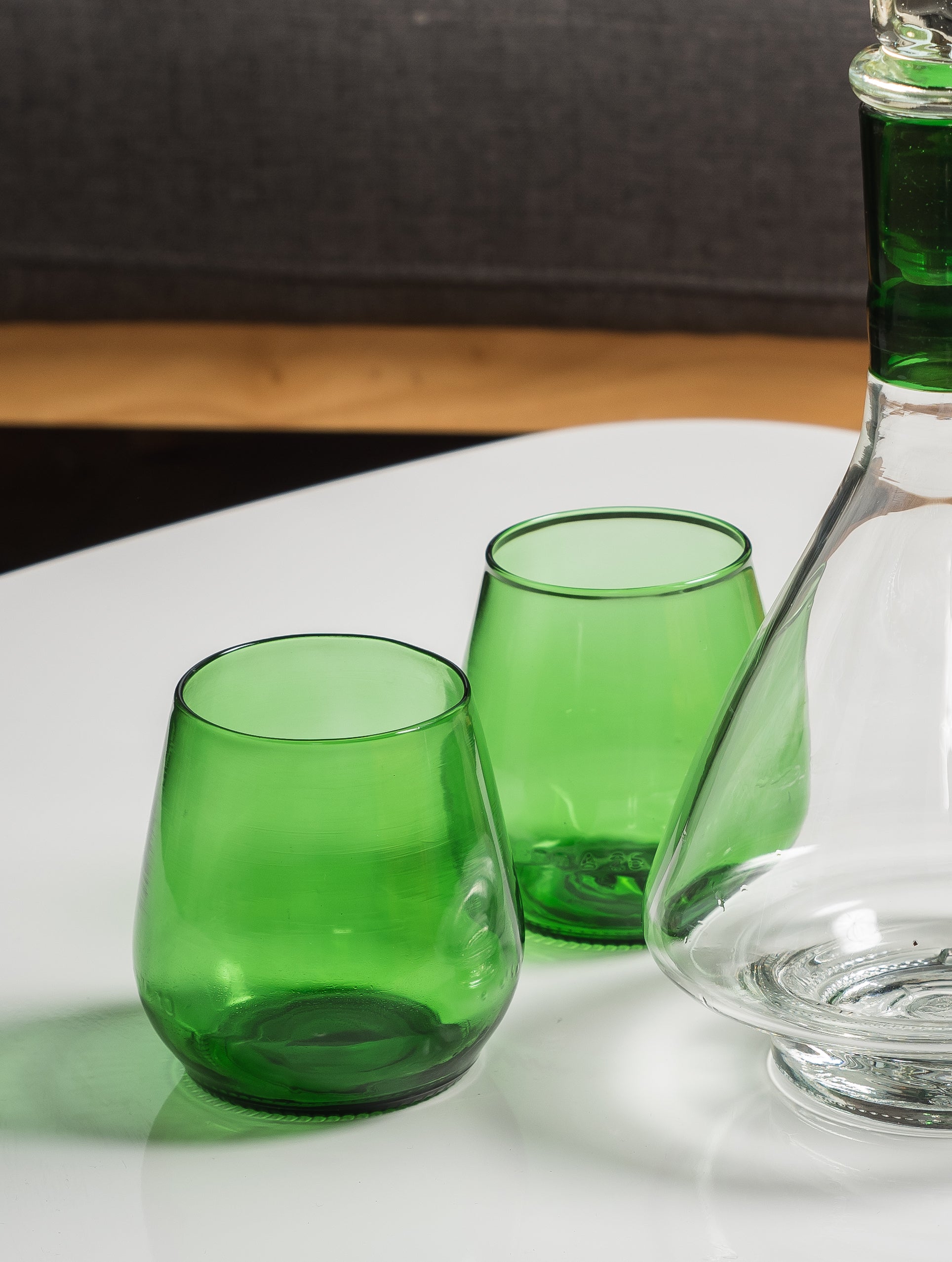 two green short glasses