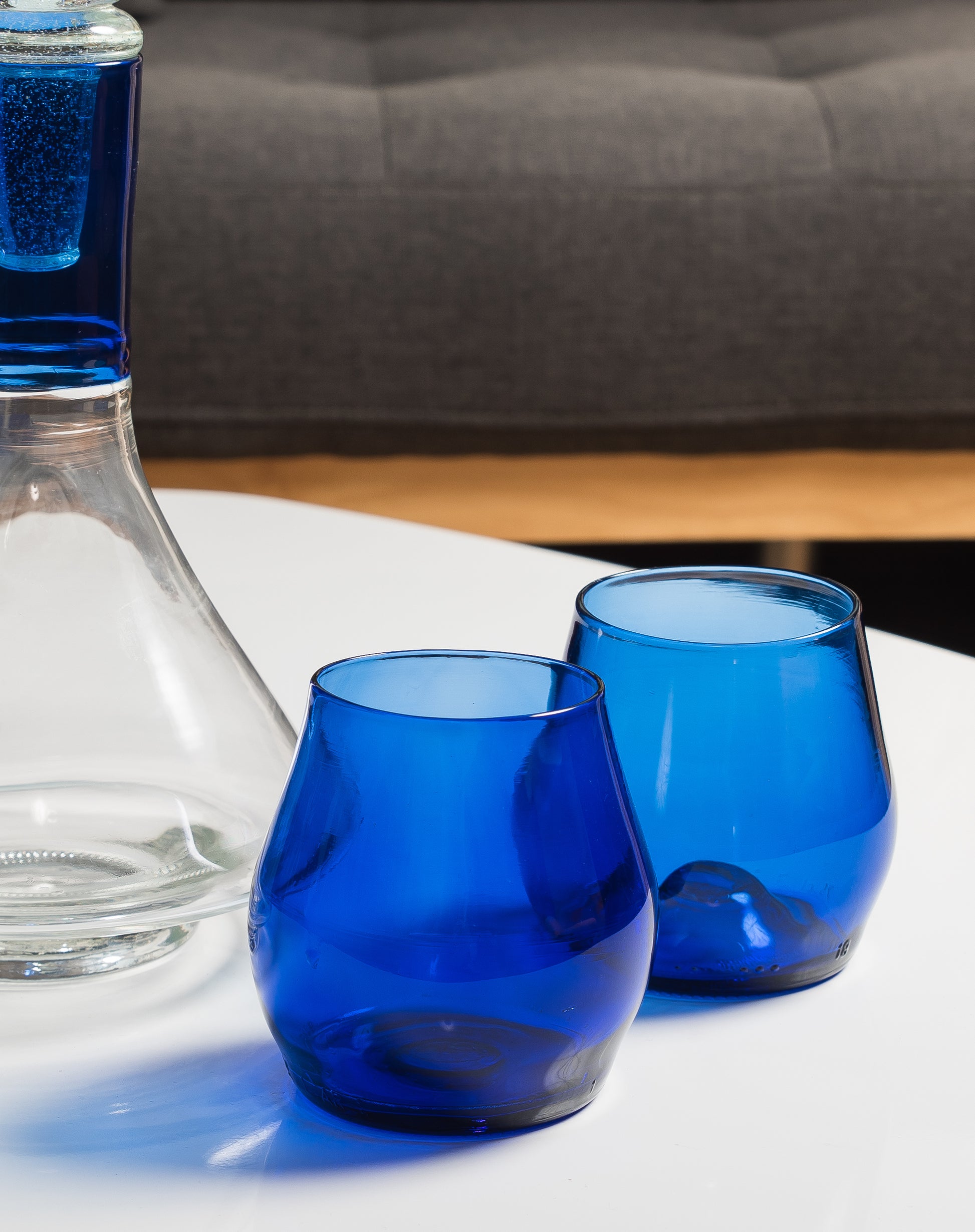 two blue short glasses