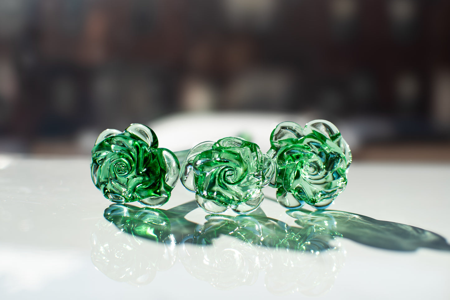 3 green recycled glass roses