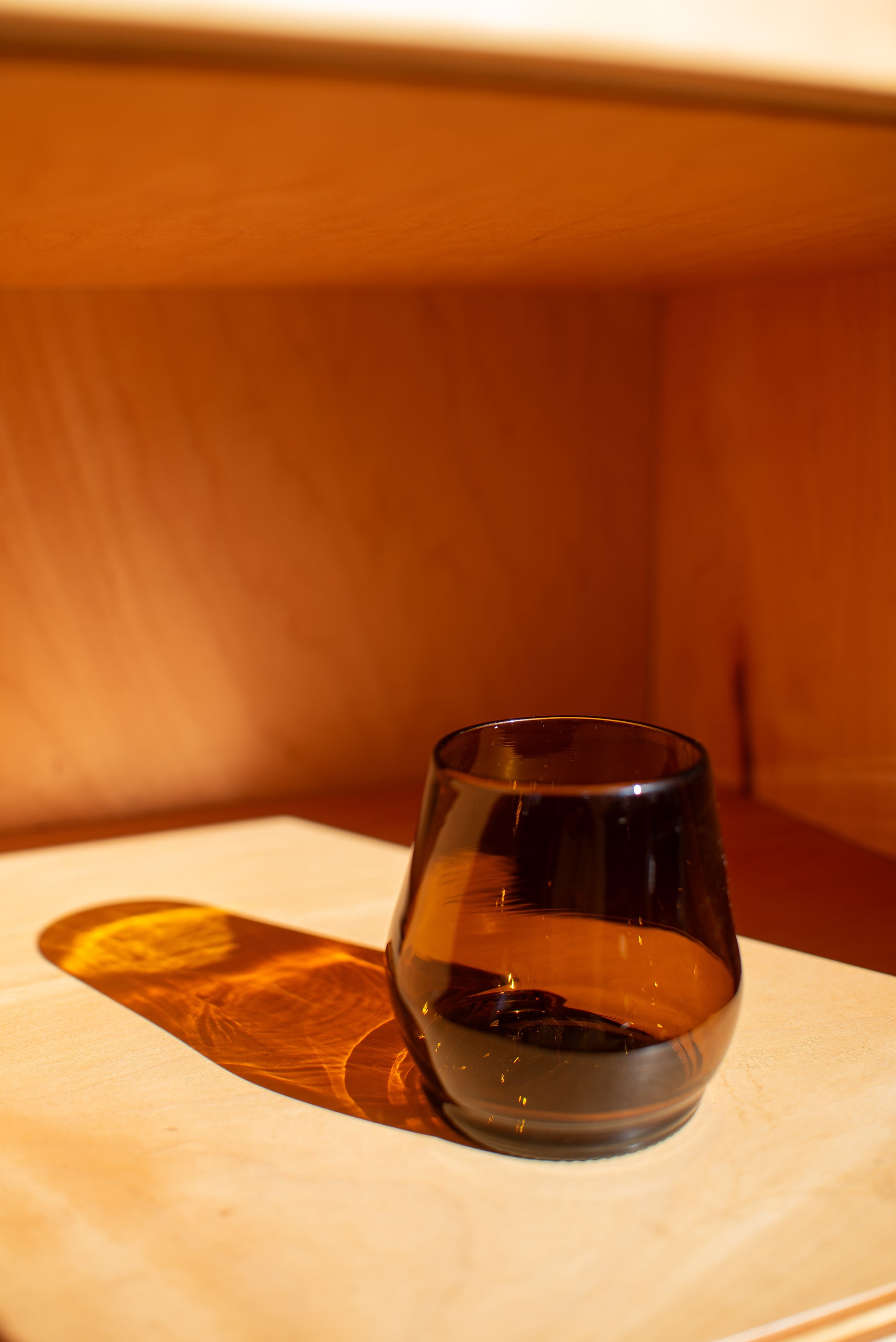 red short glass with red background