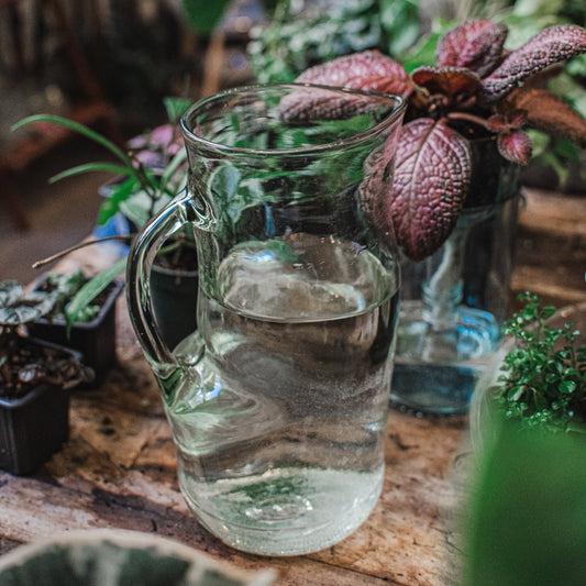 recycled glass pitcher with handle