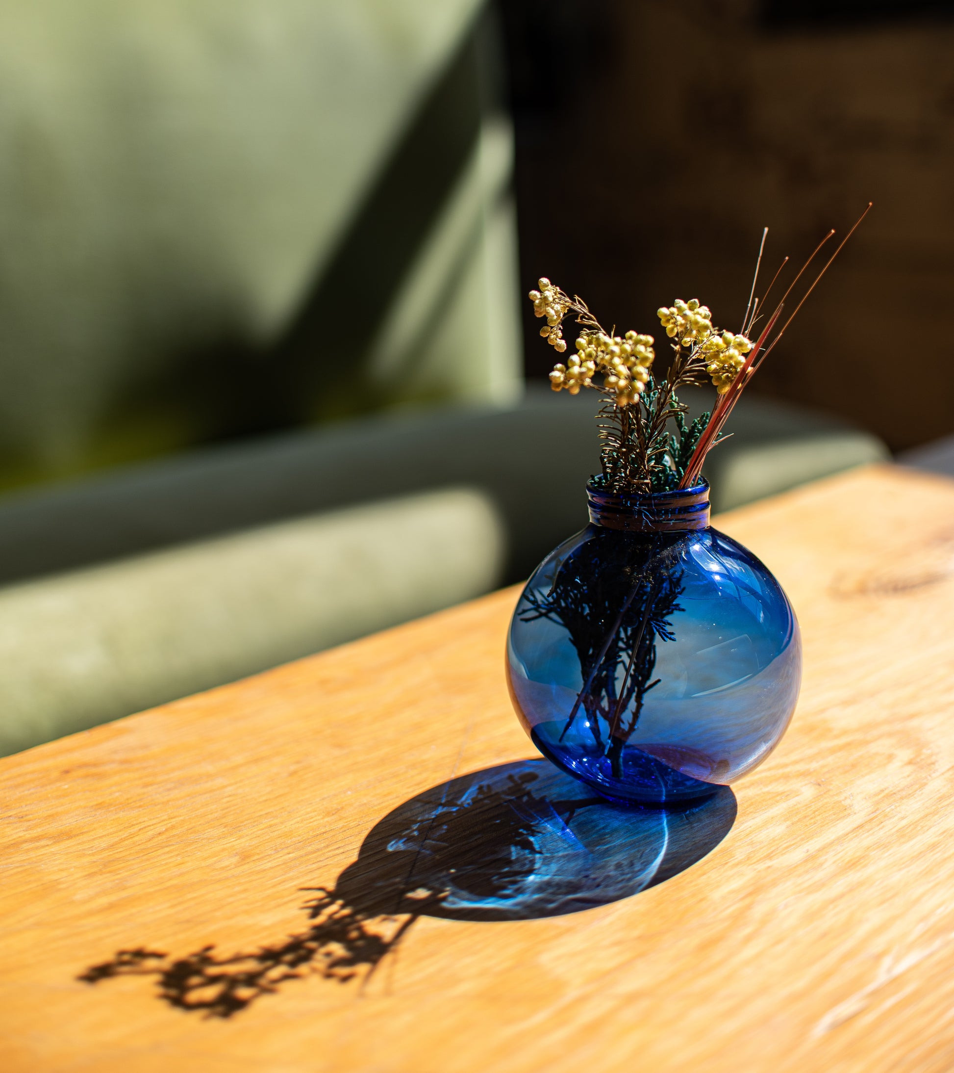 Cobalt blue recycled bud vase with dried foliage 