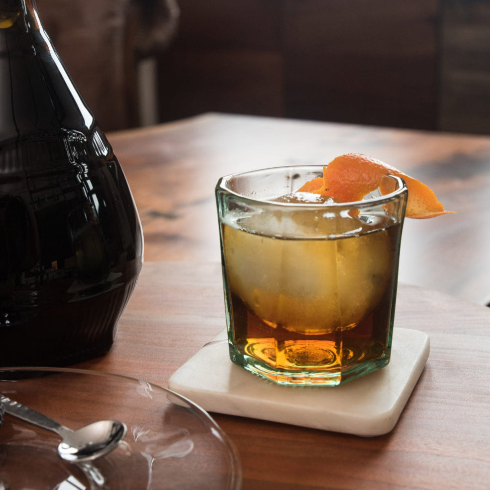 hexagonal rocks glass made from recycled glass with whisky cocktail