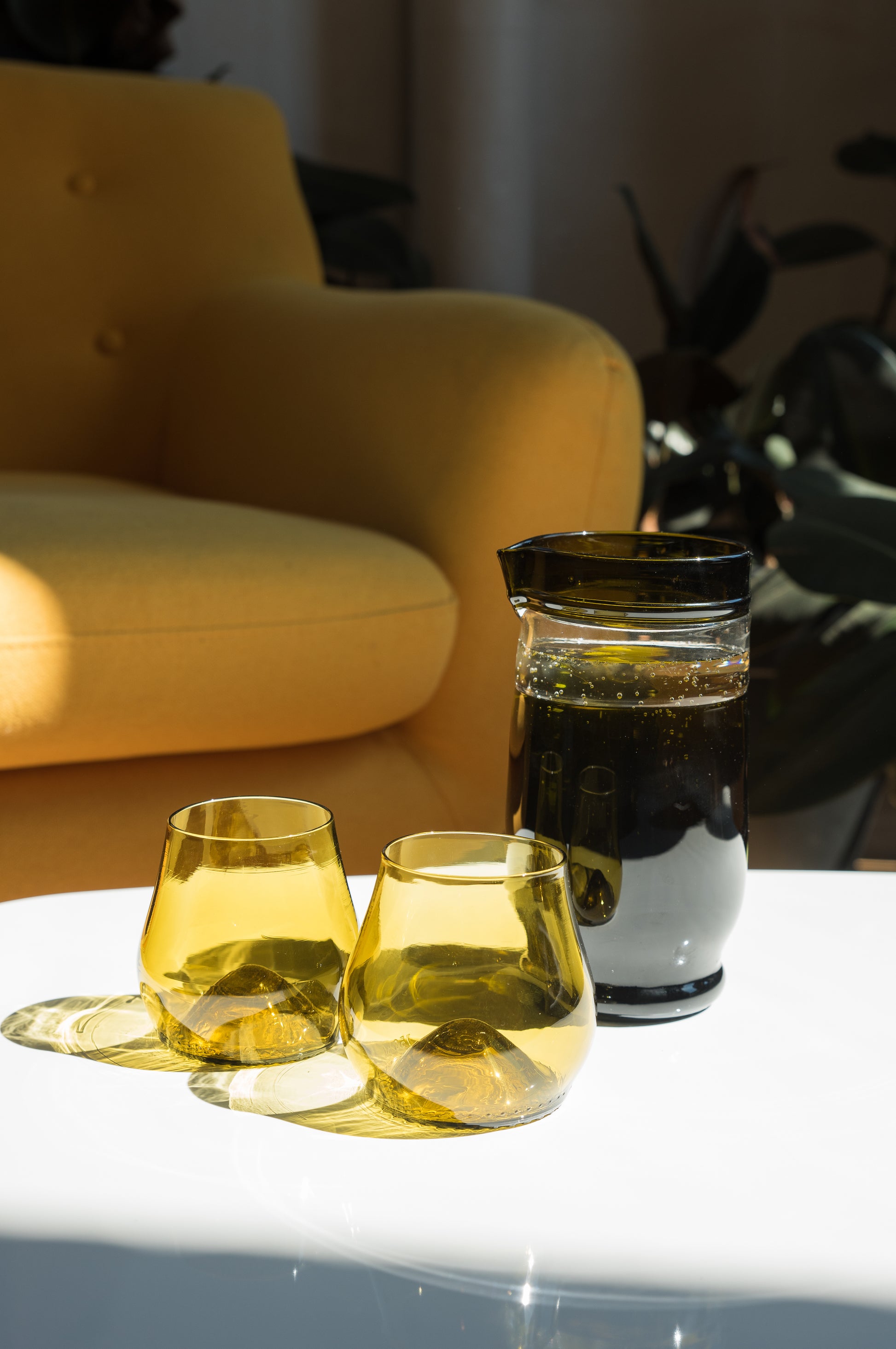 olive pitcher made from wedding champagne keepsake bottle and matching wine glasses