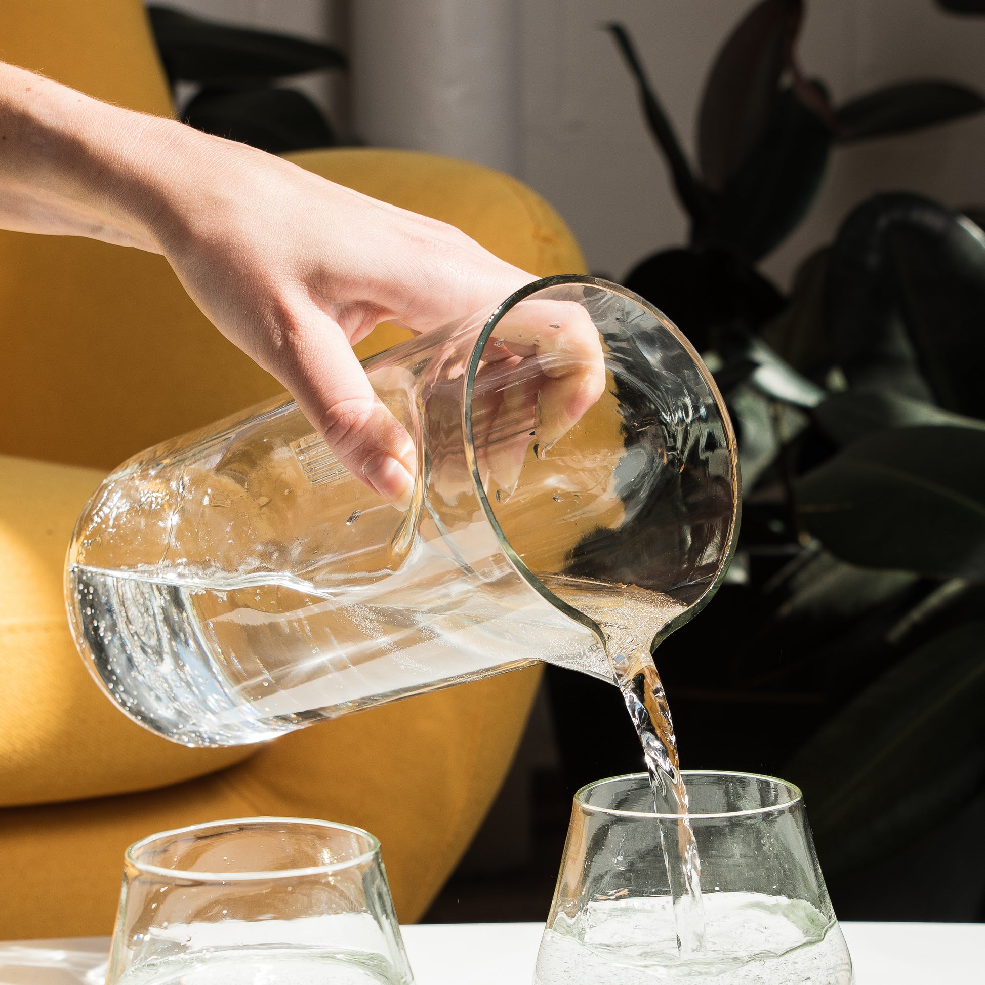 clear pitcher made from recycled glass