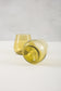 gold water or wine glasses made from recycled glass