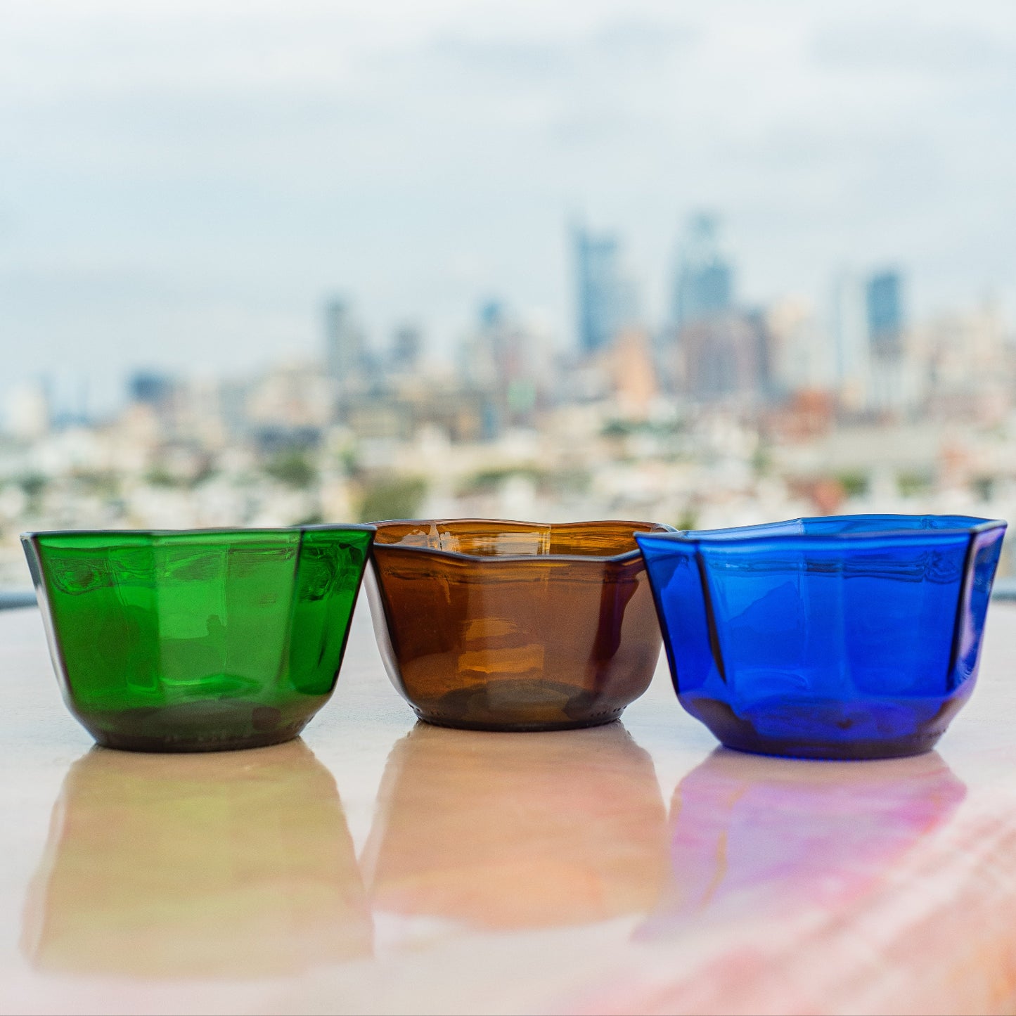 snack bowls in green brown and blue