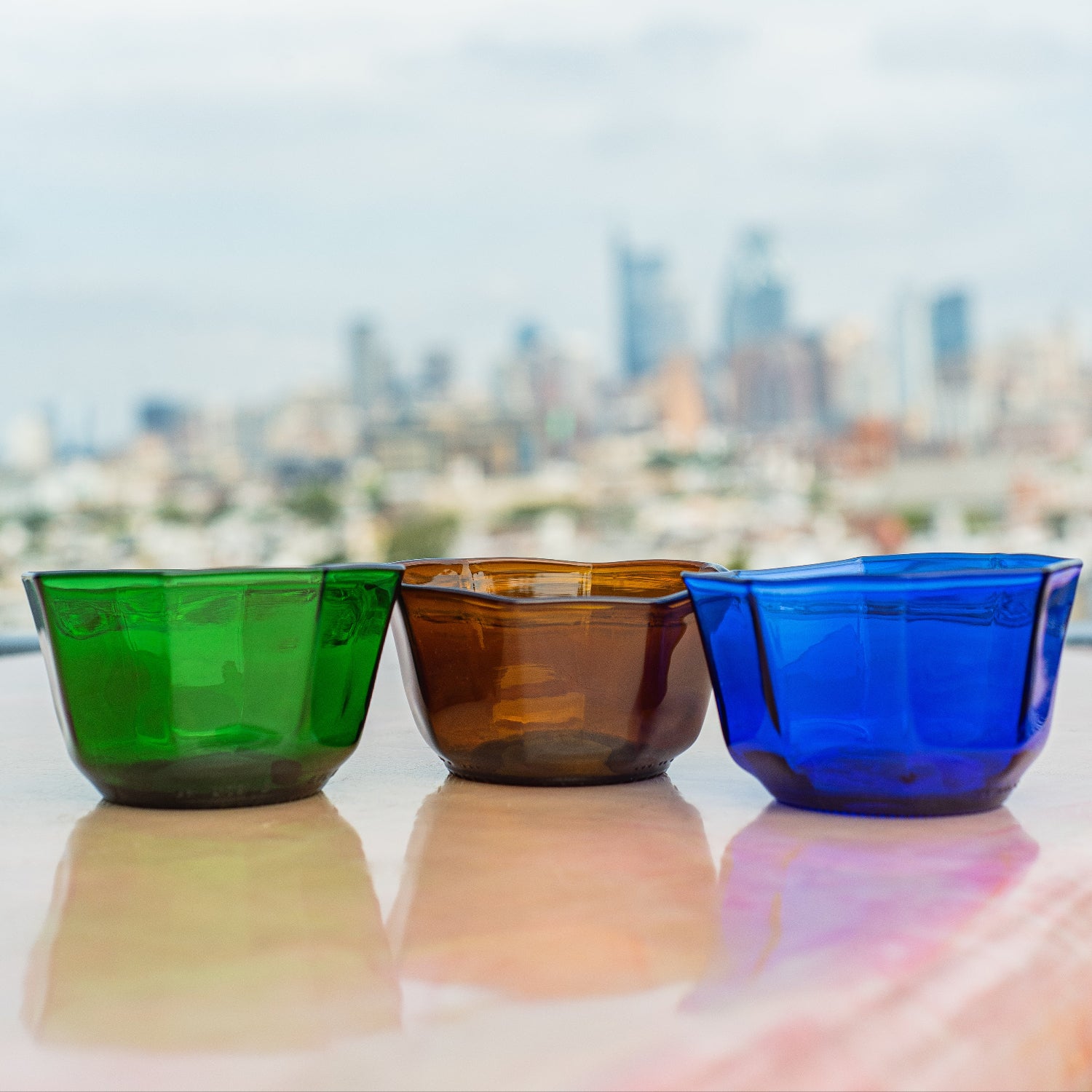snack bowls in green brown and blue