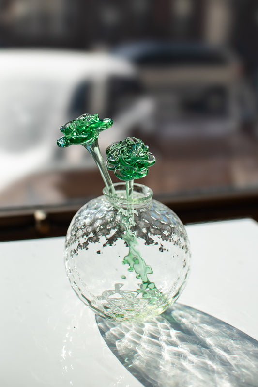 bud vase with glass rose
