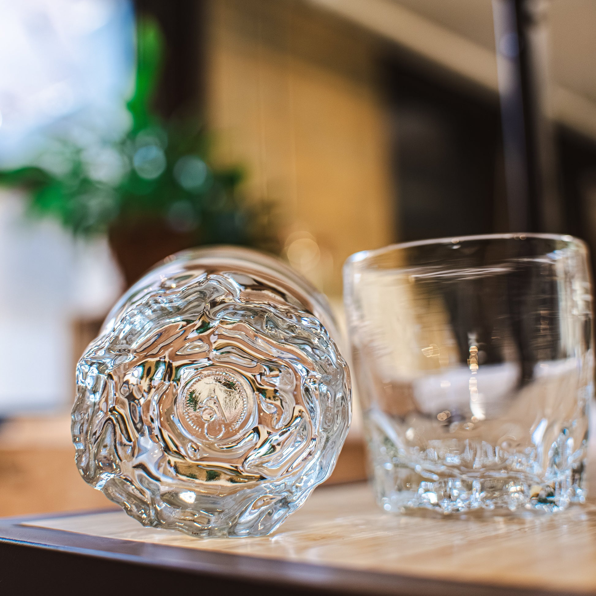 2 rocks glasses with Rose Bottoms