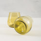 gold water or wine glasses made from recycled glass