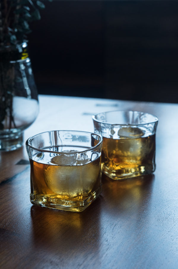 square rocks glasses made from recycled glass with whisky cocktail