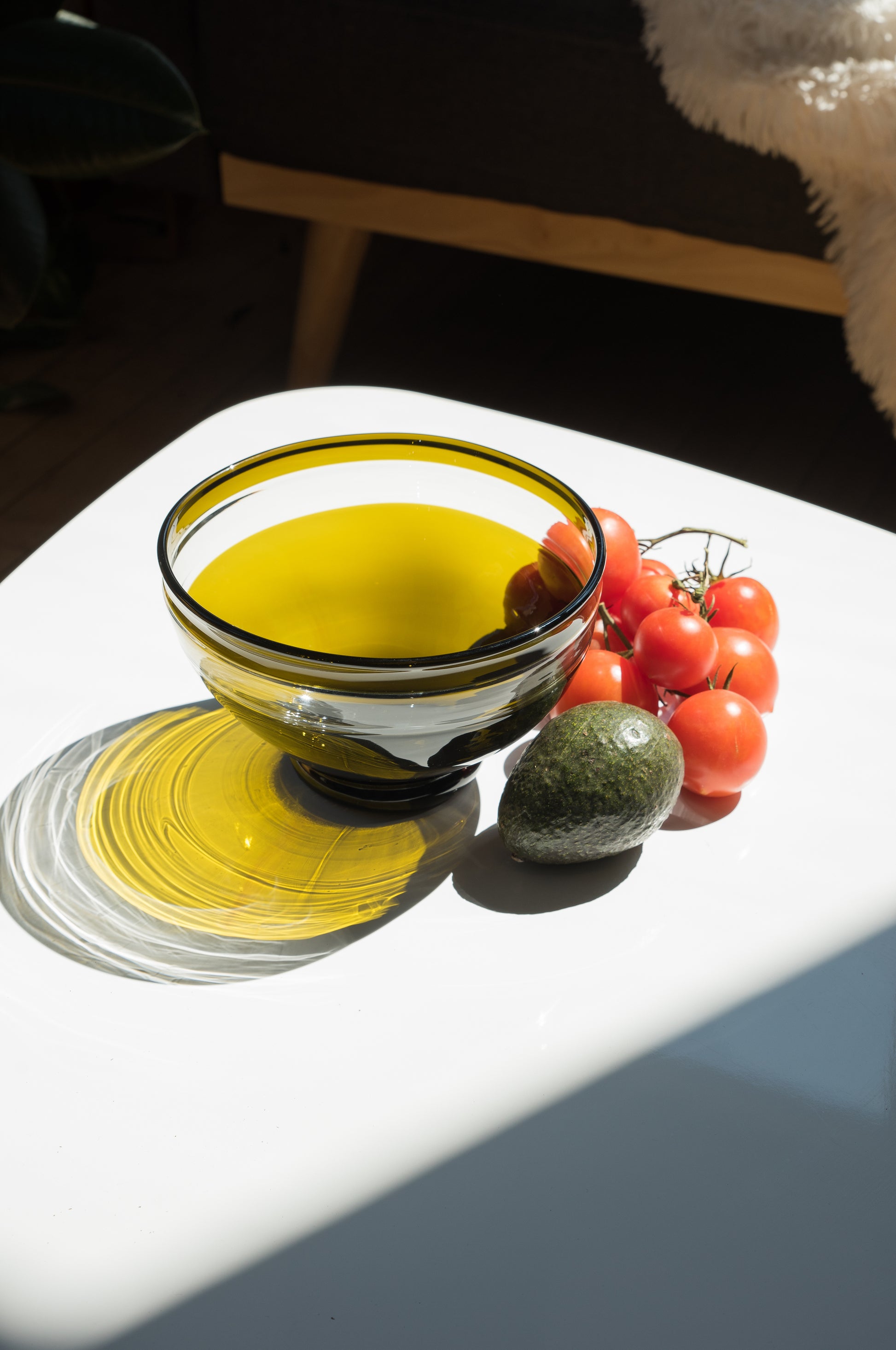 olive serving bowl made from wedding champagne keepsake bottle with avocado and tomato